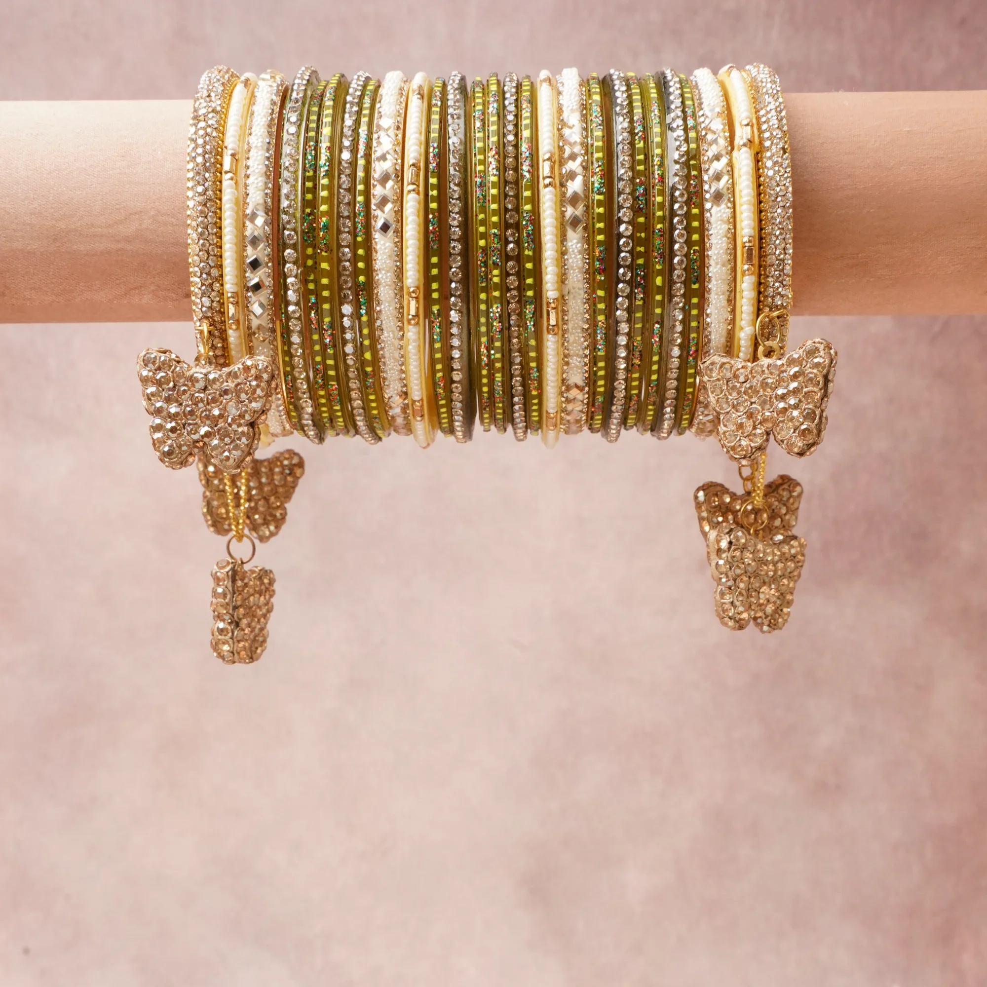 A commanding Olive Green anchors this beautiful set, enriched with accents of Cream, Gold, Clear, Ivory that add depth and dimension.

Featuring a striking composition of Glass, Metal, Rhinestones, Faux Pearls, Seed Beads, this set carries intricate craftsmanship and strong presence. Grand in form, it is created for moments that deserve to be marked.